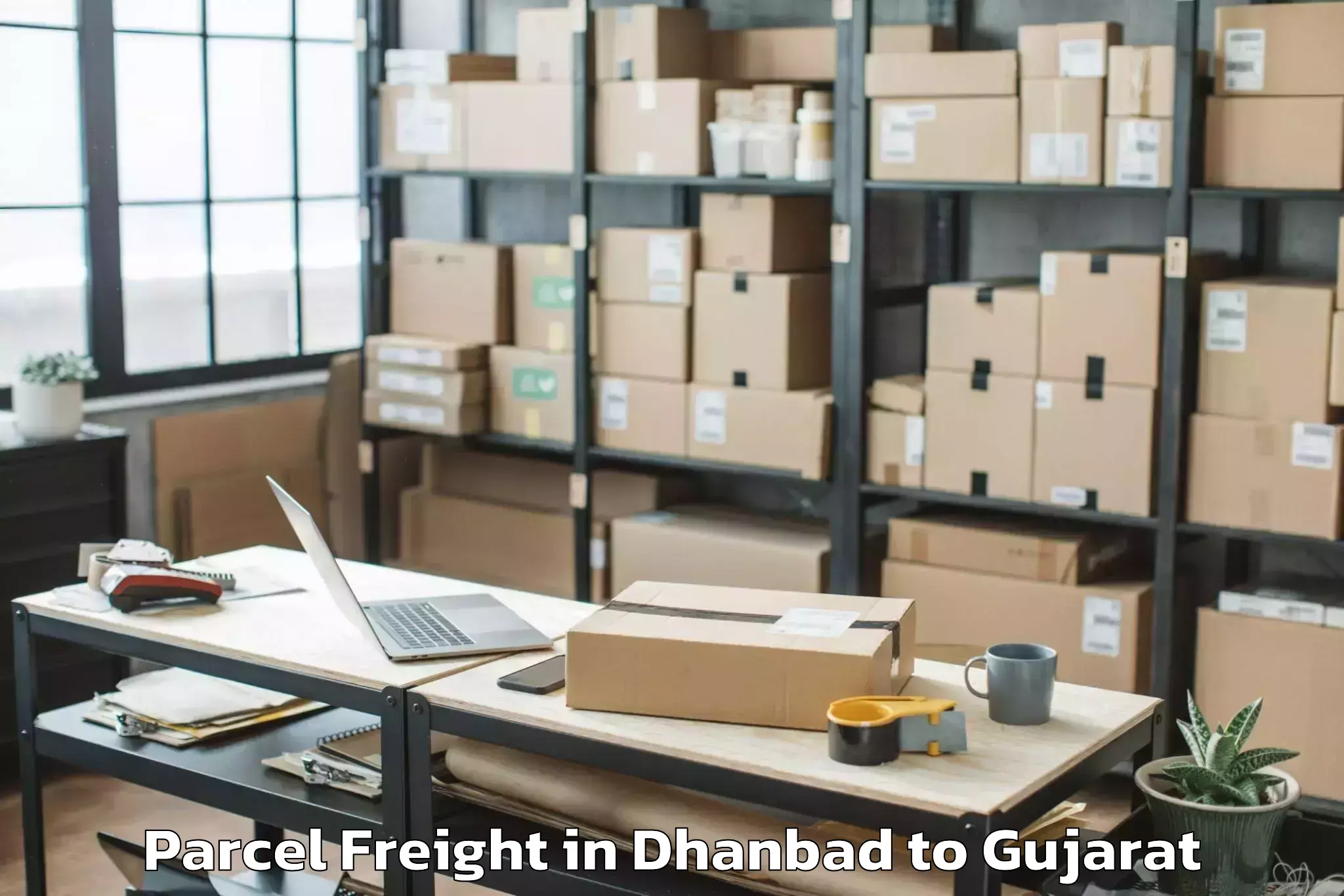 Expert Dhanbad to Unjha Parcel Freight